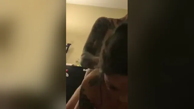 Two women engage in a hardcore threesome, frame 4 of 8
